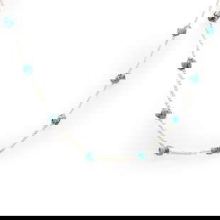 An antique seed pearl and turquoise necklace,: An antique seed pearl and turquoise necklace, with freeform turquoise beads, each stationed along a single row of gently graduated seed pearls, to a barrel clasp, stamped 9CT, and with a safety chain,