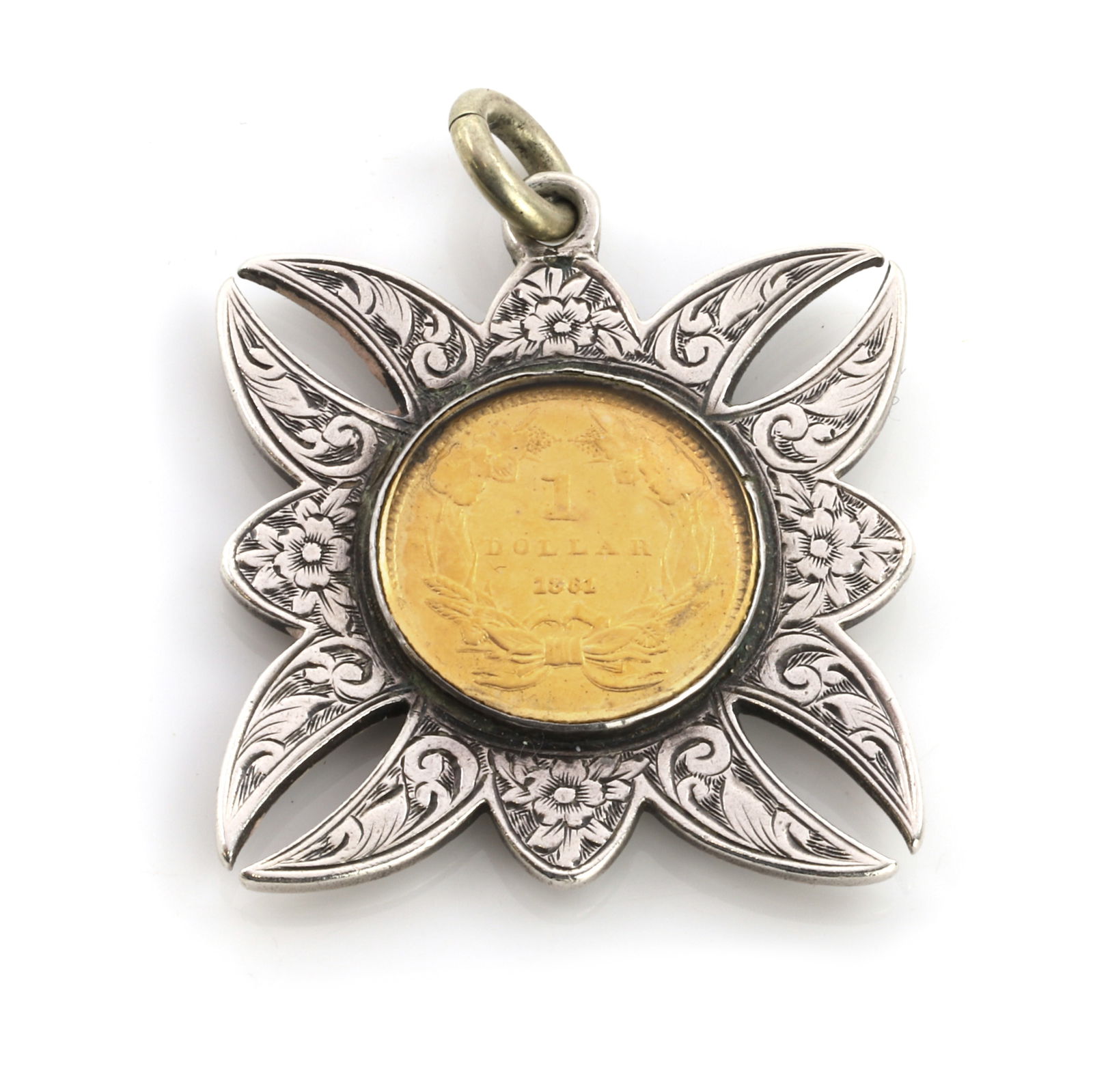 A 1 dollar coin pendant,: A 1 dollar coin pendant, the one dollar coin, dated 1861, spectacle set to a glazed silver frame with floral hand engraving to one side and scrollwork engraving verso, with an articulate bale, 34mm x