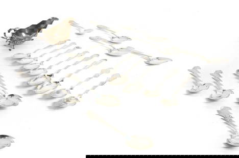 A collection of Danish silver spoons: A collection of Danish silver spoons together with a sauce boat, largest spoons 21cm long, total 23ozt (17)