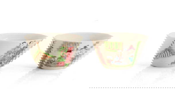 A pair of Chinese famille rose teacups,: A pair of Chinese famille rose teacups, 20th century, of circular form with a flared rim, painted with figures in a garden, 8cm diameter (2) Condition Report: Surface scratches.