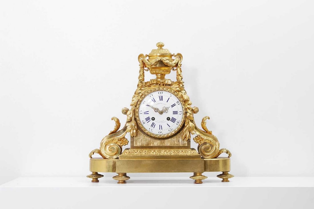A Louis XVI-style gilt-bronze mantel clock, (1 of 7)