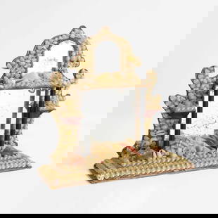 A Victorian grotto shell mirror,: A Victorian grotto shell mirror, late 19th century, with two mirror plates surrounded by encrusted seashells, 23cm wide 8cm deep 21.5cm high Condition Report: deterioration to mirror silver - otherwis