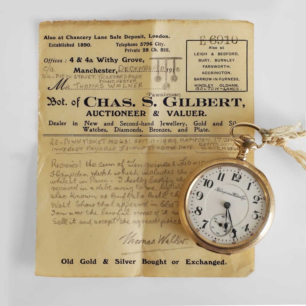 A Buffalo Bill gold-filled pocket watch,: A Buffalo Bill gold-filled pocket watch, an American gold-filled top-wind open-faced pocket watch, the enamel dial signed 'Hampden Watch Co.', with black Arabic numerals, blued spade hands and subsidi