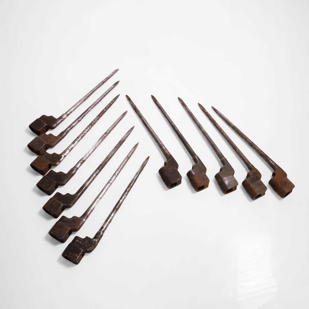 A collection of twelve British No. 4 Mk II bayonets,: A collection of twelve British No. 4 Mk II bayonets, 5.5cm long (12) Shipping Disclaimer: Buyers must be aware of their country’s shipping and import policies regarding guns, knives, swords, and