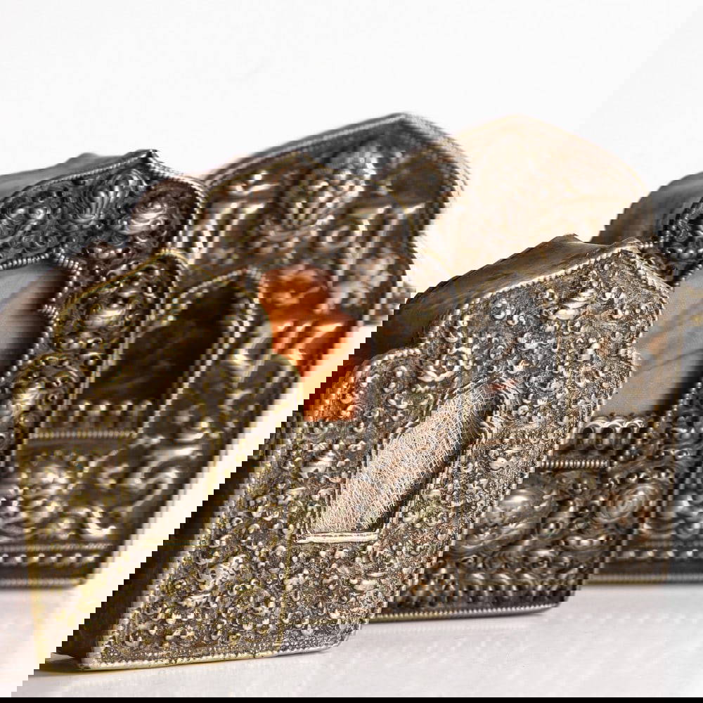 Three Tibetan white-metal alloy travel shrines,