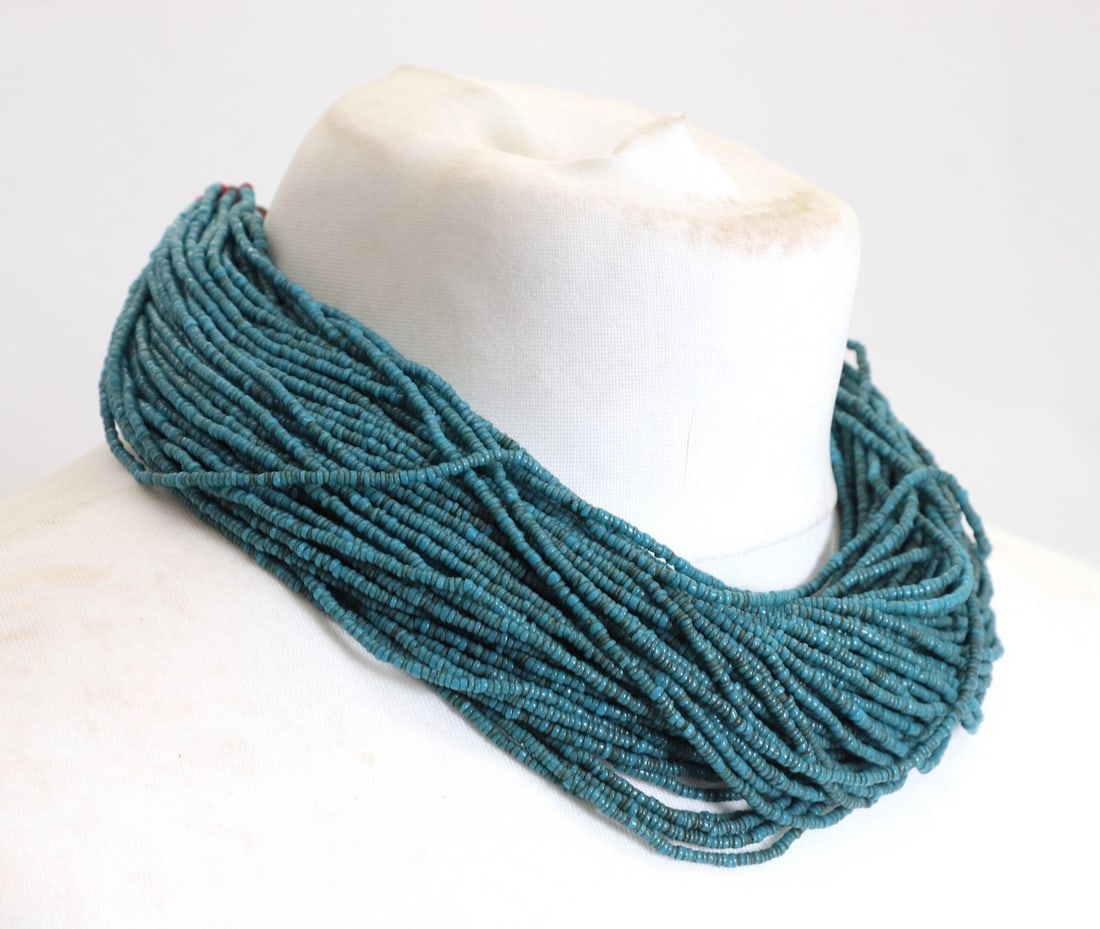 A Naga blue glass multi-strand beaded necklace, (1 of 2)