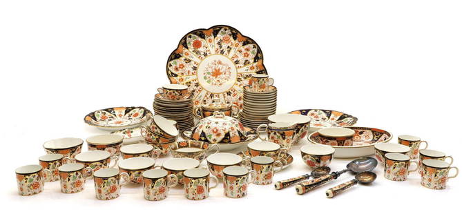 An extensive Royal Crown Derby tea and coffee service,: An extensive Royal Crown Derby tea and coffee service, 20th century, Imari pattern, number 6041, to include dishes, cups, sifter spoons, and a tray, tray 35cm diameter, (qty.) Condition Report: Rubbin