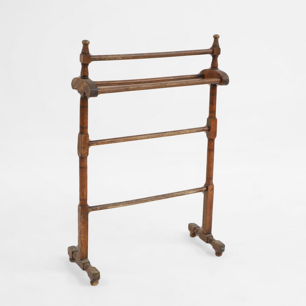 A pine towel rail,: A pine towel rail, with turned wood supports and legs, 56cm wide 85cm high
