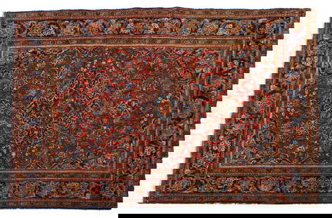 A pair of central Persian Kashan rugs,: A pair of central Persian Kashan rugs, each with central floral motif to a red ground, with continuous floral decoration, to navy borders, 205 x 130cm (2)
