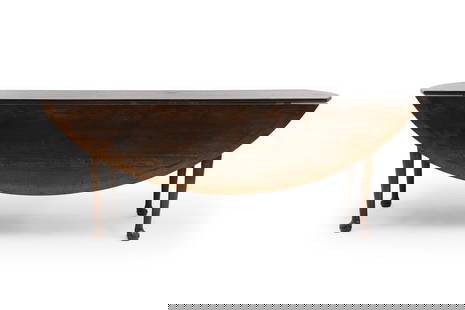 A George II style oak dining table,: A George II style oak dining table, 20th century, banded in burr oak, on column legs and pad feet, 214cm wide 163cm deep 77cm high