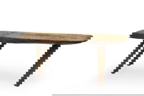 A vernacular ash and elm pig bench,: A vernacular ash and elm pig bench, 19th century, with knarled top, raised on splayed legs, of jointed construction, 79cm wide 21cm deep 32cm high Condition Report: Knocks and wear, cuts into the wood