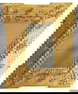 A carved and gilt wall mirror,: A carved and gilt wall mirror, 20th century, with moulded frame and floral swag decoration, 66 x 75cm Condition Report: Fair overall.