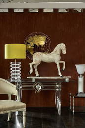 A carved and painted model of a horse,