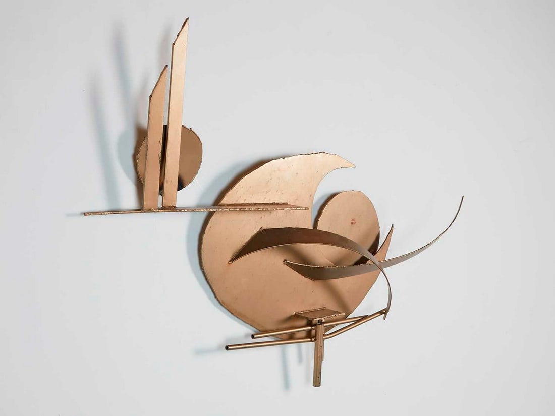 A large cut-steel brutalist wall sculpture,: A large cut-steel brutalist wall sculpture, 1960s, in the manner of Silas Seandel, unsigned, 128cm wide 17cm deep 70cm high Condition Report: With two ring suspensions. Approx sizes, as hanging.