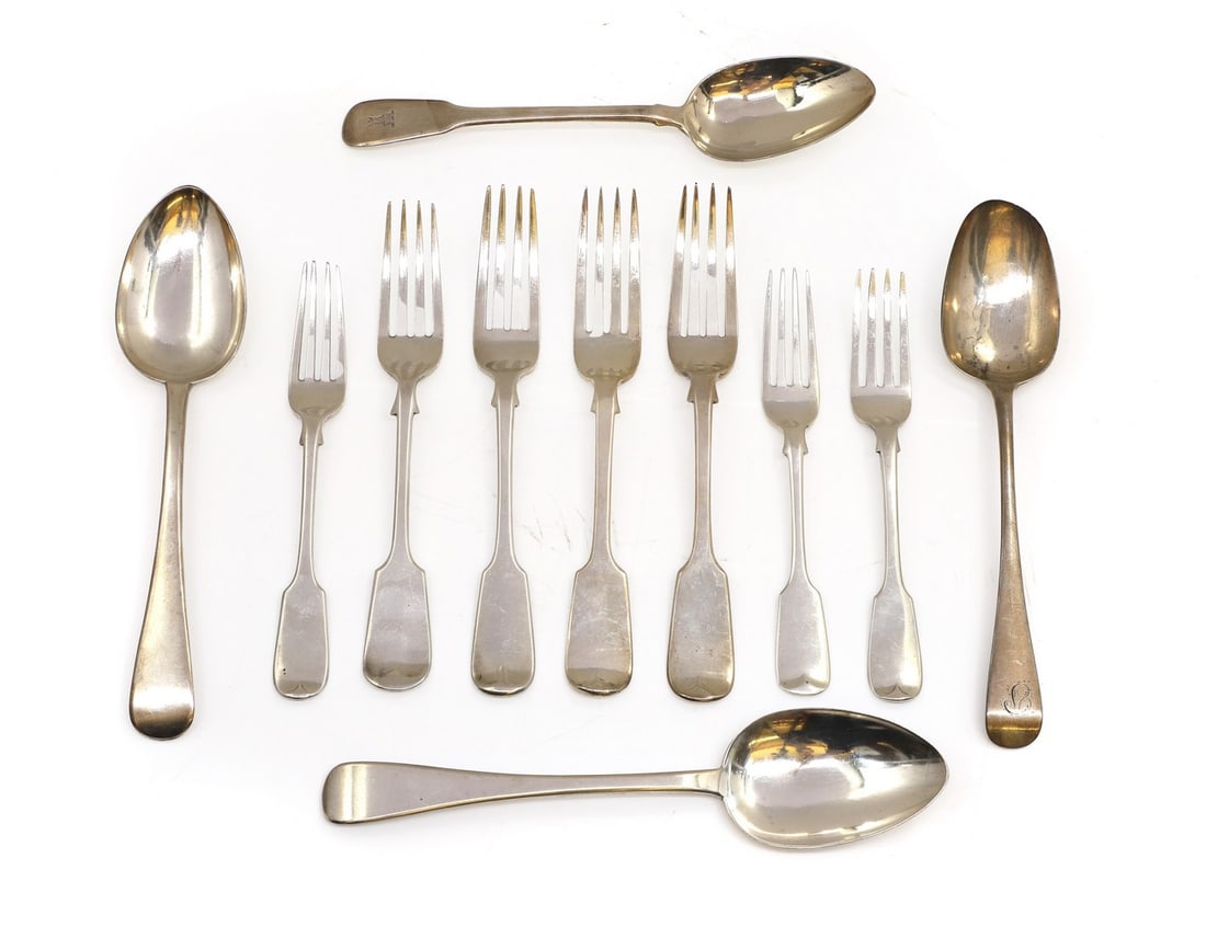 A collection of silver flatware,: A collection of silver flatware, to include four serving spoons, two by Robert Williams, 1838, Exeter, and seven Fiddle pattern dinner forks, including one by Thomas Smily, 1859, London, and another b