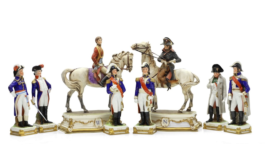 A Capodimonte figure Napoleon on horseback,: A Capodimonte figure Napoleon on horseback, a similar of Wellington on horseback, 34.5cm high, a collection of French soldiers, 25.5cm high, and a figure of Napoleon on a plinth base, 25cm high (8)