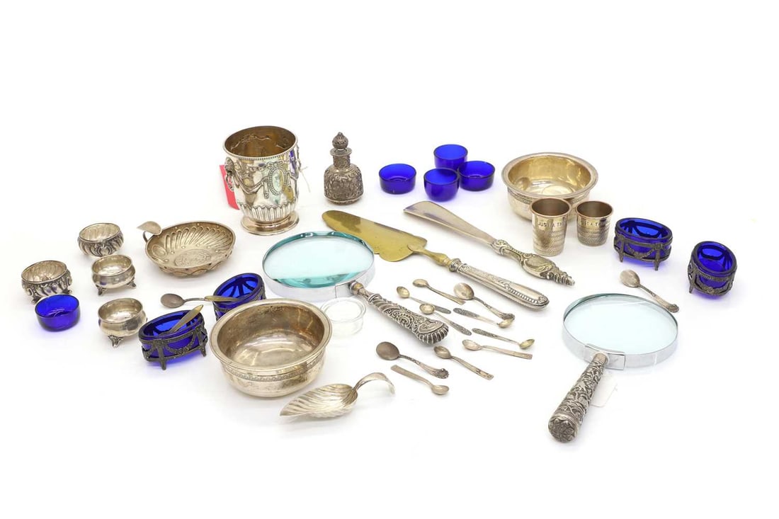 A collection of silver and silver-plated items,: A collection of silver and silver-plated items, to include a small two-handled pot, by Charles Stuart Harris, 1899, London, 8cm wide, two small silver salts, Spanish, with associated blue glass liner