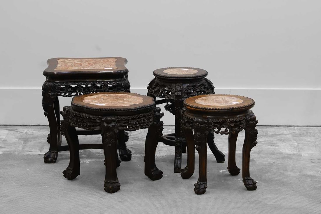 A Chinese carved hardwood urn stand, (1 of 5)