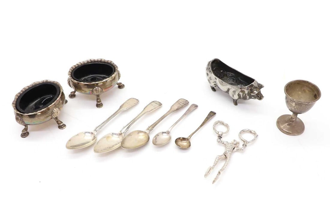 A collection of silver items,: A collection of silver items, to include a pair of Edwardian novelty sugar tongs, harlequin form with two coiled snakes that form the handles, and shell bowls, by Charles Douglas Richard Hanbury-Trac