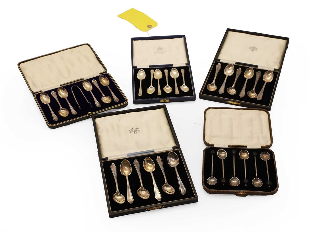 A collection of case silver teaspoons,: A collection of case silver teaspoons, incuding a set of six by Mappin & Webb, Sheffield, 1961, another two sets of six by Northern Goldsmiths Co, Birmingham, 1926, a set of silver case teaspoons