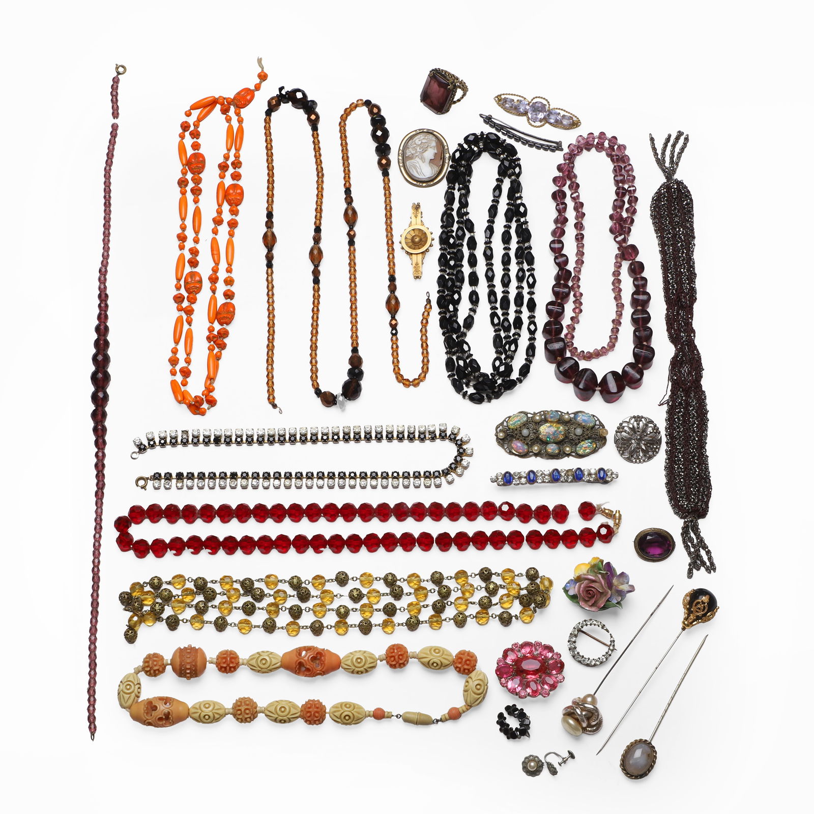 A jewellery box containing a collection of antique and vintage costume jewellery,: A jewellery box containing a collection of antique and vintage costume jewellery, to include a Victorian gold bar brooch, stamped 15, lacking pin, a carved celluloid coral coloured floral bead necklac