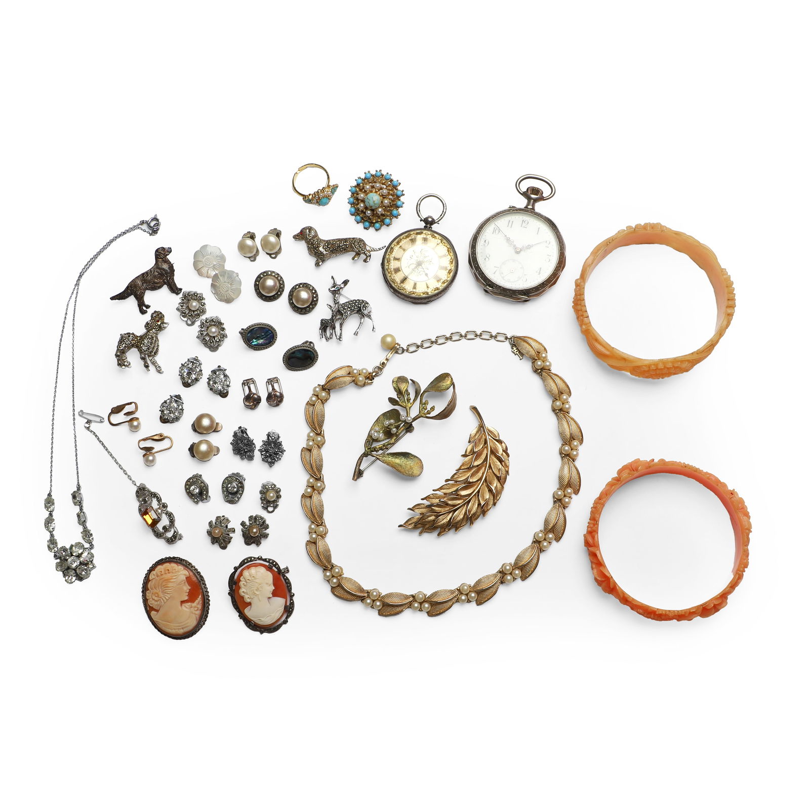 A group of costume jewellery,: A group of costume jewellery, to include a silver shell cameo brooch, Birmingham 1986, a gilt metal faux pearl necklace, by Trifari, a gilt metal foliate brooch, by Trifari, two vintage coral colour e