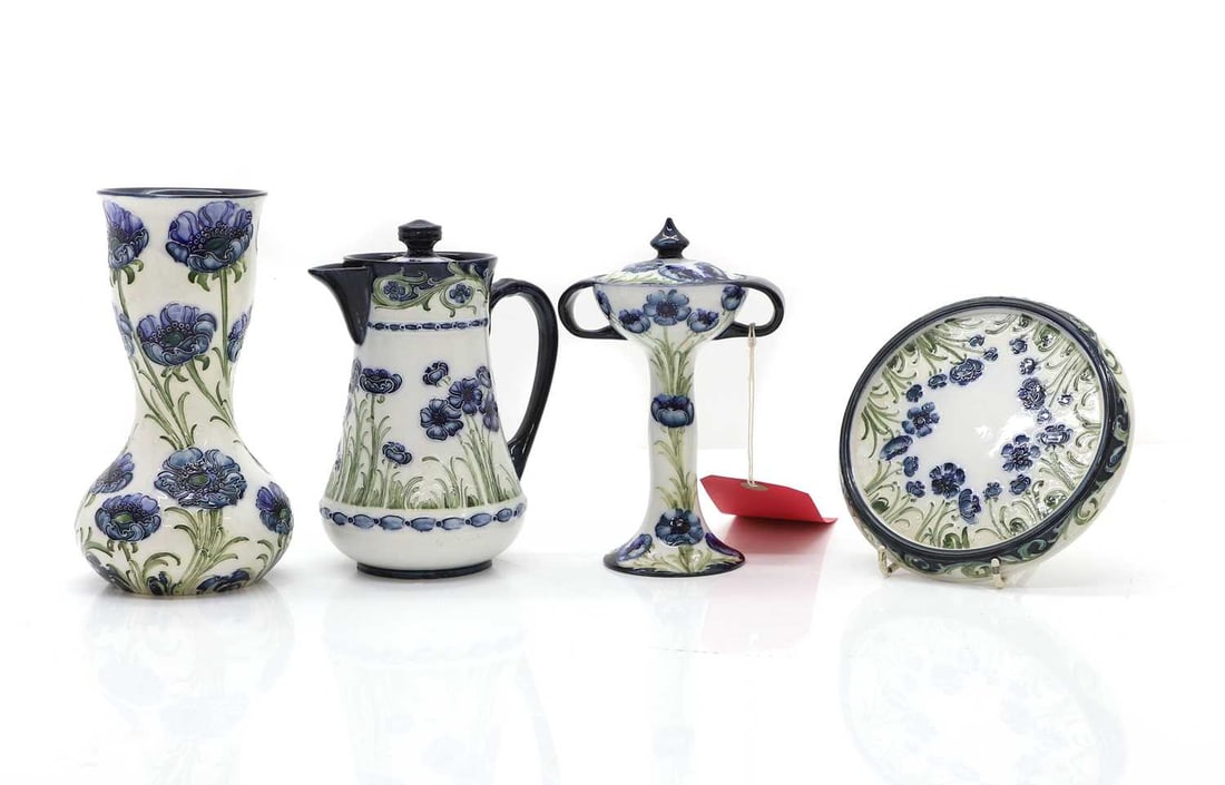 A group of four Macintyre Moorcroft Florian 'Blue Poppy' pieces, (1 of 2)