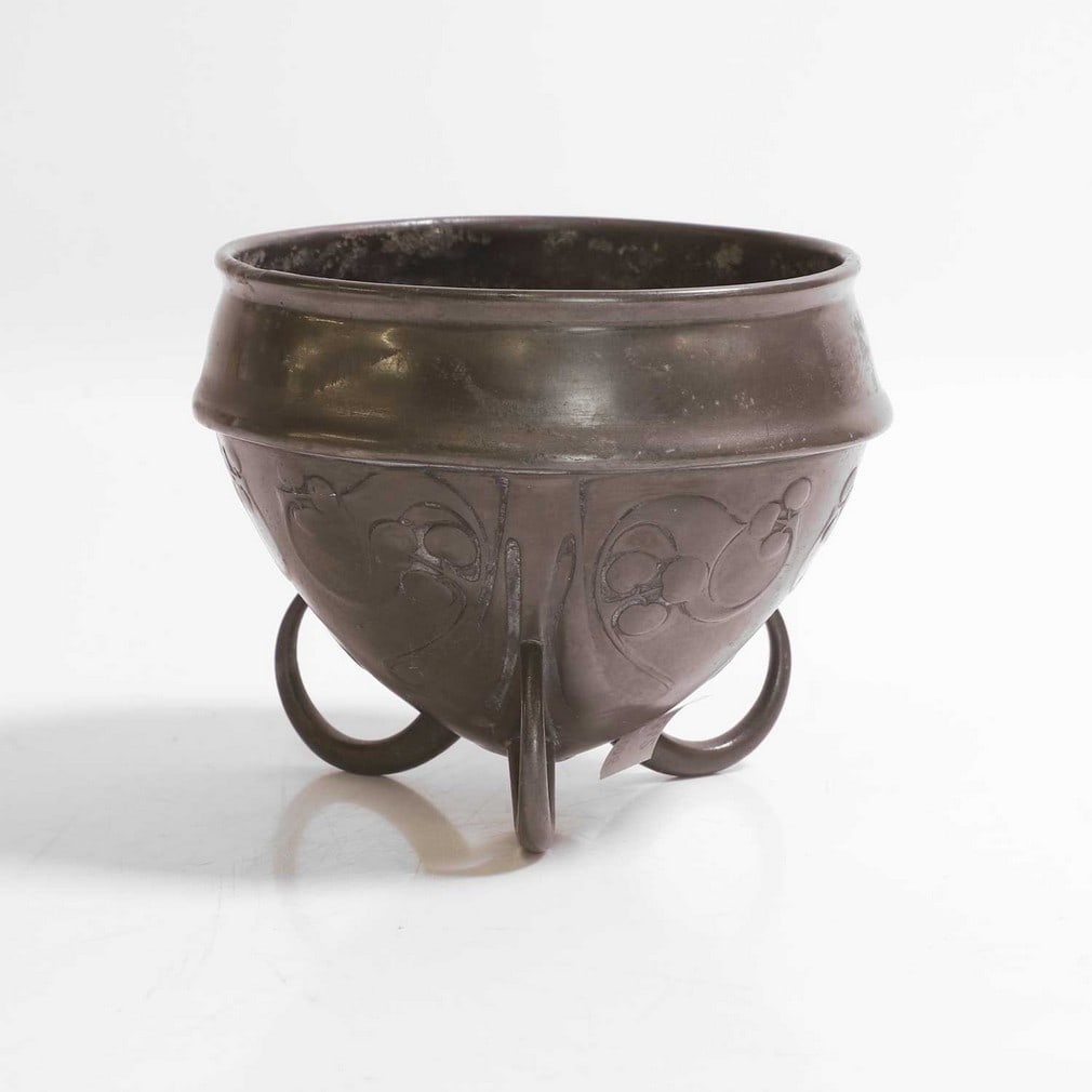 Archibald Knox (1864-1933) for Liberty & Co.,: Archibald Knox (1864-1933) for Liberty & Co., a pewter bowl, raised on three looped feet, impressed model number '0277' and 'ENGLISH PEWTER MADE IN ENGLAND', 13.5cm diameter 10.6cm high
