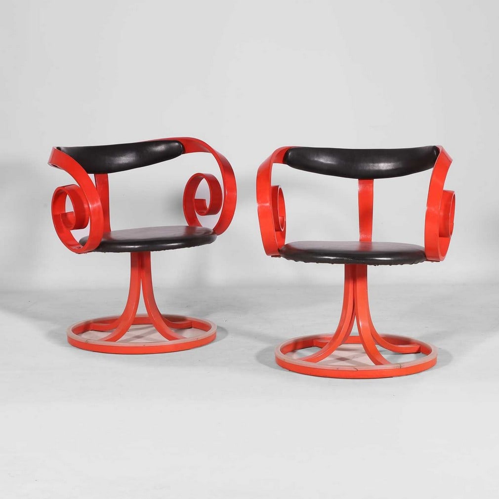 George Mulhauser (American, 1916–2002) for Plycraft Corp.,: George Mulhauser (American, 1916–2002) for Plycraft Corp., a pair of 'Sultana' chairs, designed in 1965, American, each red-lacquered bent plywood frame with a swivel mechanism and black vinyl s