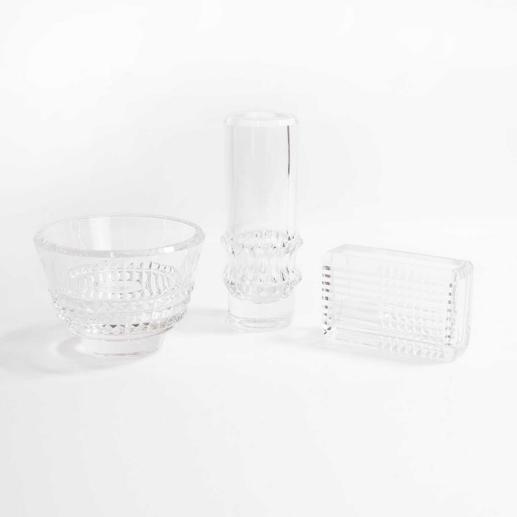 Bengt Edenfalk (Swedish, 1924-2016),: Bengt Edenfalk (Swedish, 1924-2016), three cut-glass vases, c.1950s, produced at Skruf, each with cut decoration, engraved signatures, 8.5, 11 and 20cm high (3) Condition Report: Nibbles to the cuttin