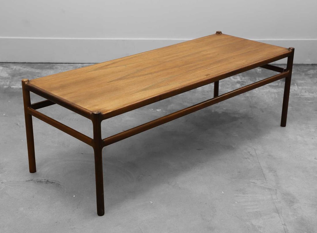 § A Danish rosewood low side table,: § A Danish rosewood low side table, mid 20th century, Johannes Anderson for CFC Silkeborg, labelled 'MADE IN DENMARK, CFC, SILKEBORG',149cm wide60cm deep51cm highArticle 10 Transaction Specific