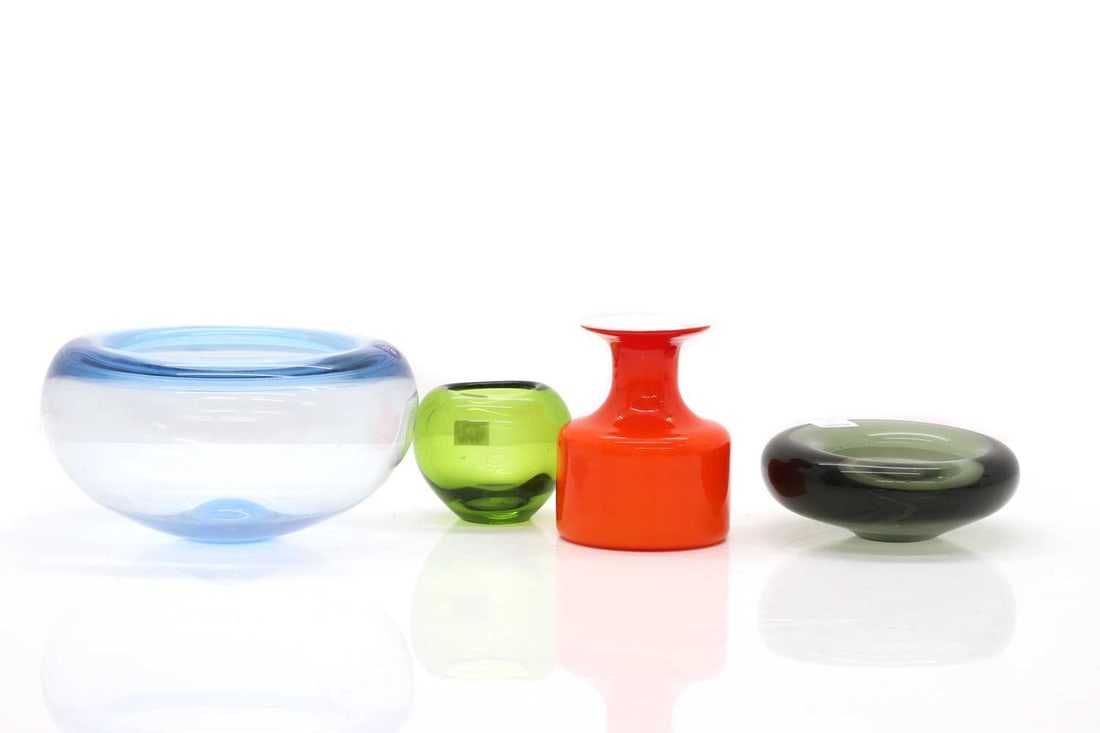 A collection of Holmegaard glass,: A collection of Holmegaard glass, mid-20th century and later, comprising a Carnaby vase, designed by Per Lutken, 11cm high, a symmetric bowl, engraved signature, 13cm diameter, a similar green vase,