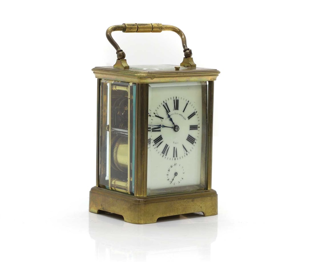 A fine French brass repeater carriage clock,: A fine French brass repeater carriage clock, c.1880, Sir John Bennett Ltd, Paris, the white enamelled dial, with Roman numerals, blue steel Breguet hands, subsidiary alarm dial, within a gilt brass g