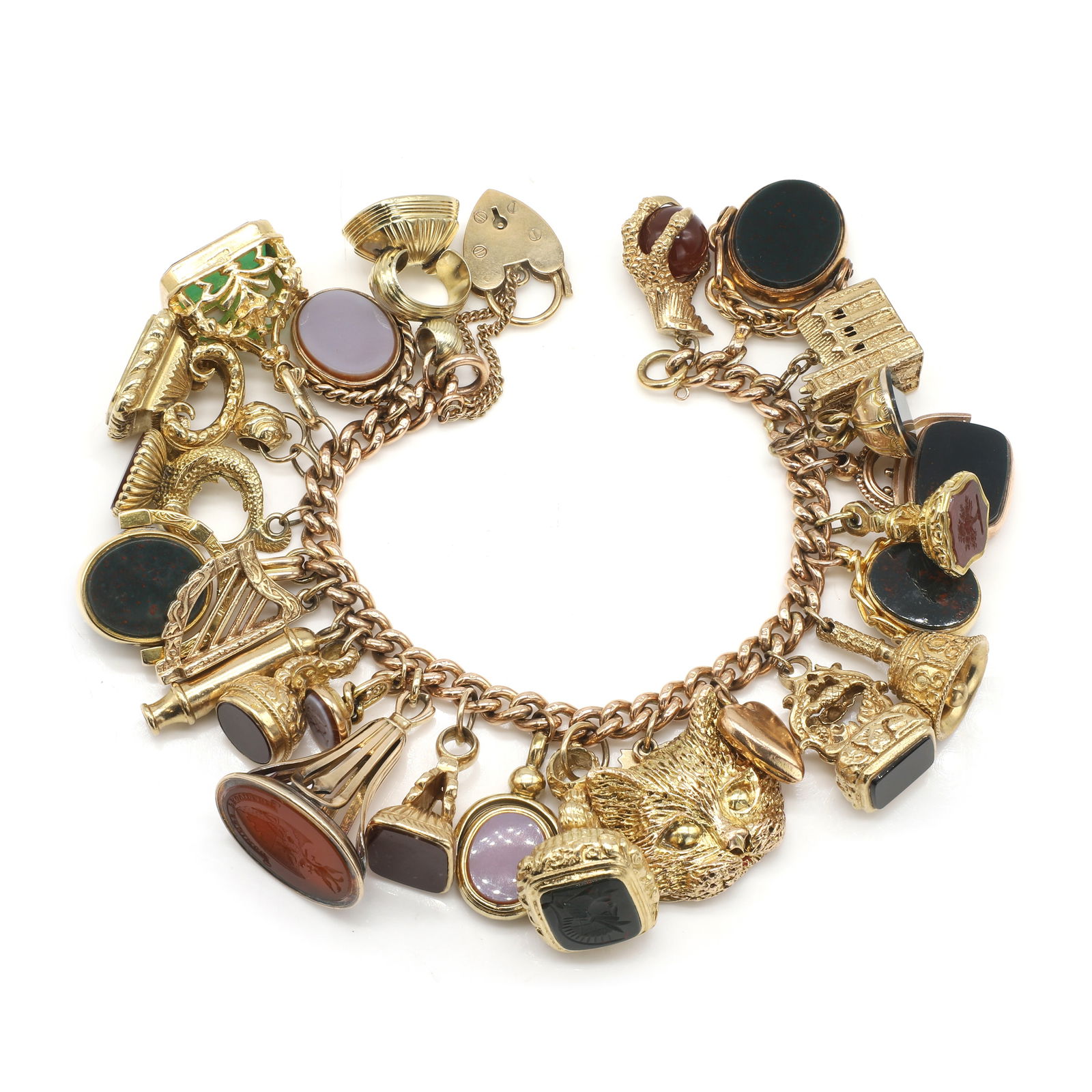 A 9ct gold charm bracelet,: A 9ct gold charm bracelet, comprising a rose gold curb link bracelet, each link marked 9.375, suspending 26 charms to include: a 9ct gold claw with carnelian ball, a 9ct gold bloodstone and carnelian
