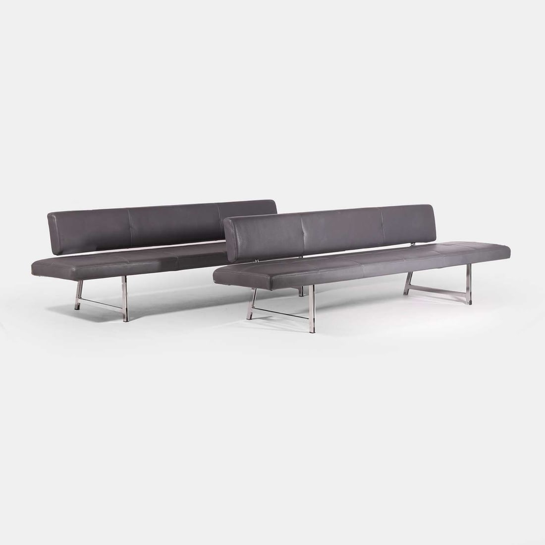 A pair of 'Foster 510' Foster+Partners for Walter Knoll four-seater bench sofas,: A pair of 'Foster 510' Foster+Partners for Walter Knoll four-seater bench sofas, originally designed in 2008, each upholstered in grey leather, supported on a polished aluminium frame, with manufactu