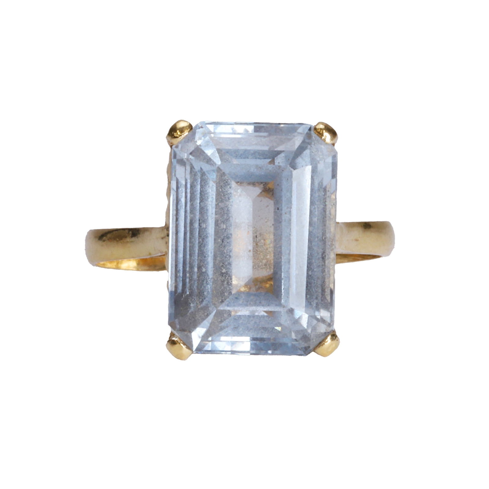 A synthetic blue spinel single stone ring,: A synthetic blue spinel single stone ring, four claw set with a rectangular cut synthetic blue spinel single stone ring, to a wire twist basket and 'D' profile shoulders and shank, stamped 750, Italia