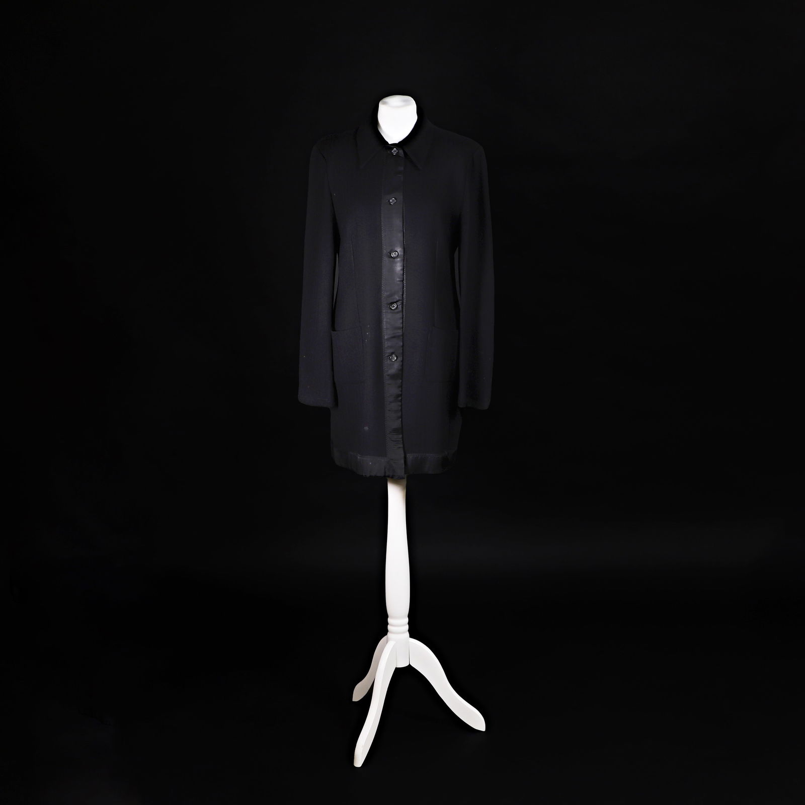 A Dries Van Noten unstructured jacket,: A Dries Van Noten unstructured jacket, c.1990s, cut in black herringbone wool, with a black silk placket, five button closure and two patch pockets, with label 'Dries Van Noten', size stated EU 44, bu