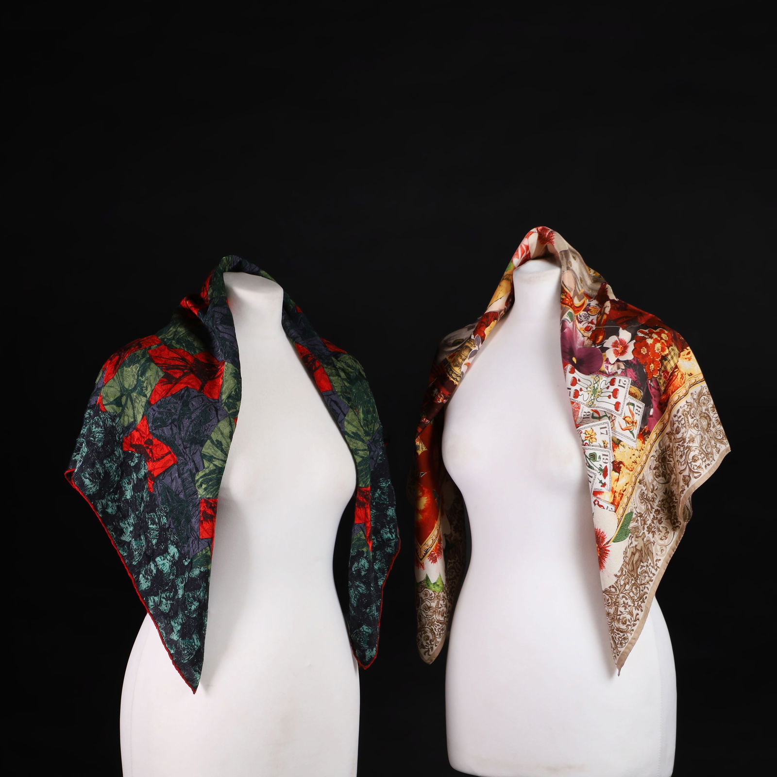 Two Emanuel Ungaro silk scarves,: Two Emanuel Ungaro silk scarves, c.1990s, the first example decorated with an abstract floral pattern in tones of red, green and grey, inscribed 'Emanuel Ungaro' to the bottom left corner, with care l