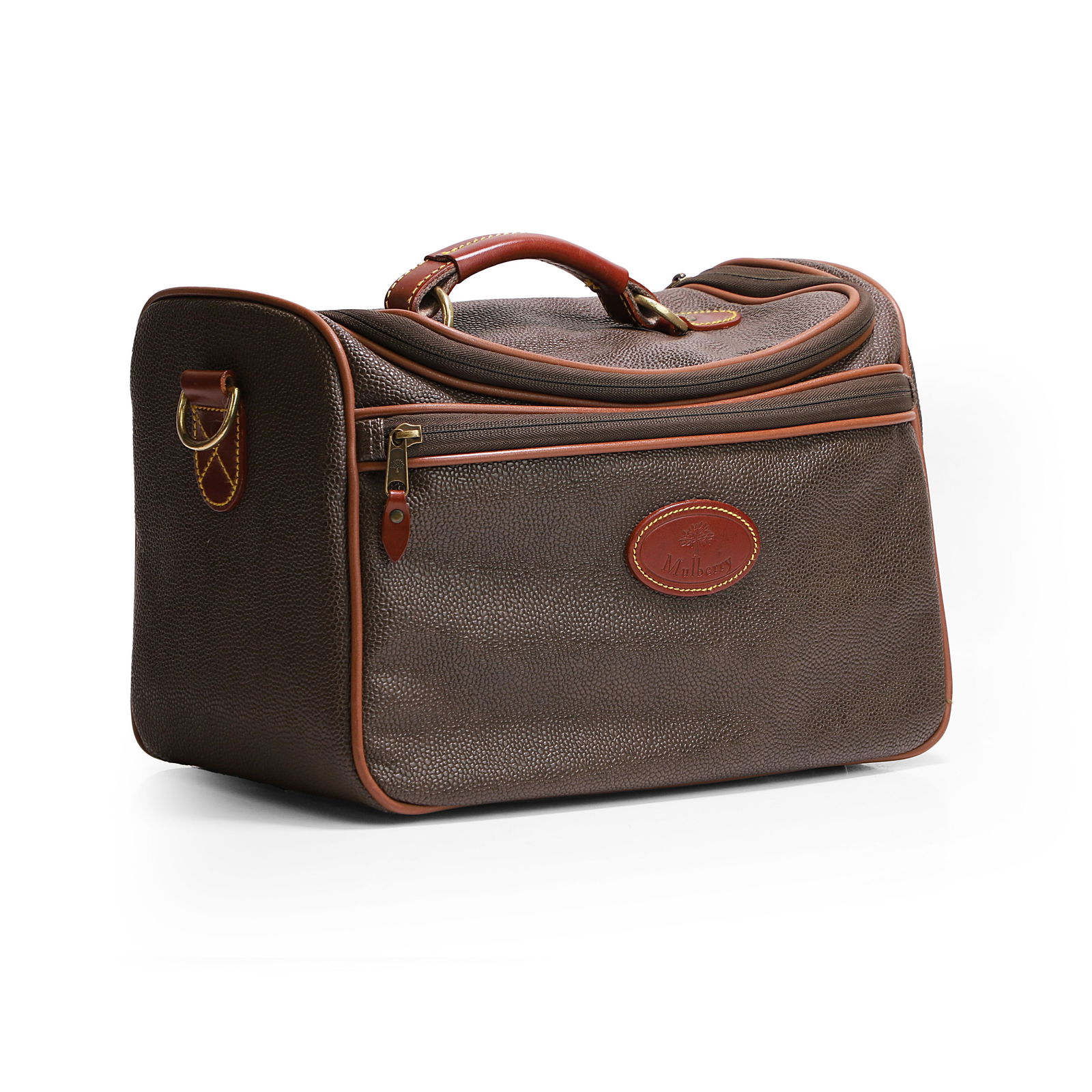 A Mulberry soft-sided vanity case: A Mulberry soft-sided vanity case of recent manufacture, the exterior in mole colour heritage scotch grain leather, with cognac leather accents and piping, gold tone hardware, leather top handle, sing