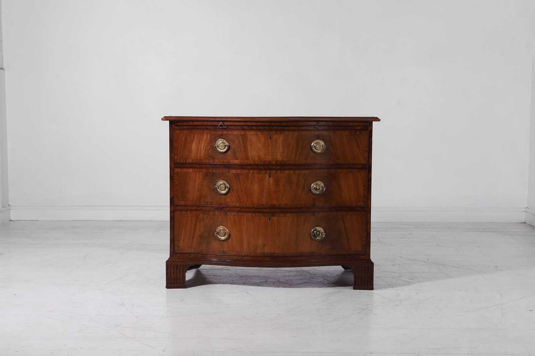 A George III mahogany serpentine chest of drawers, (1 of 6)