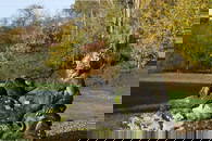 A carved limestone statue after the antique,