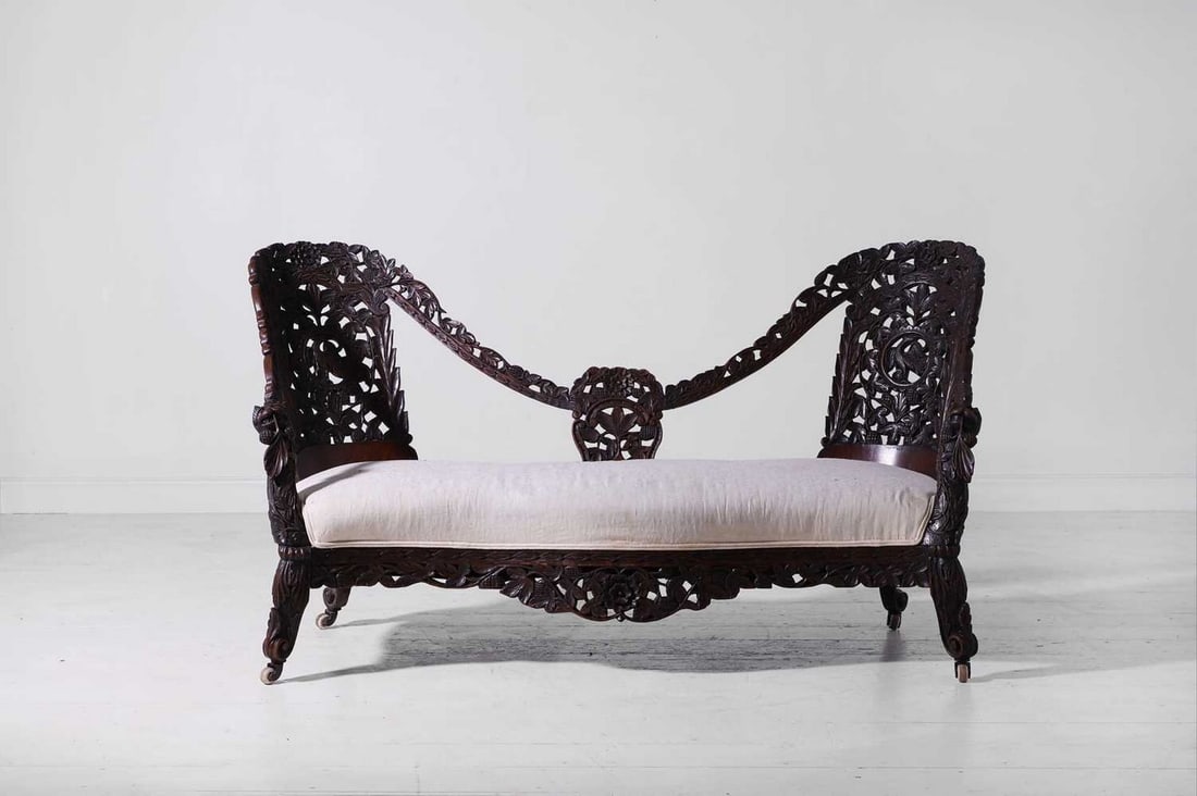 A carved teak settee, (1 of 7)