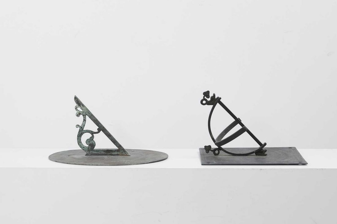 Two bronze sundials,: Two bronze sundials, comprising one circular, with etched compass and Roman numerals, 30cm diameter, and one square, in 17th-century style (2) Provenance: An East Anglian Private Collection