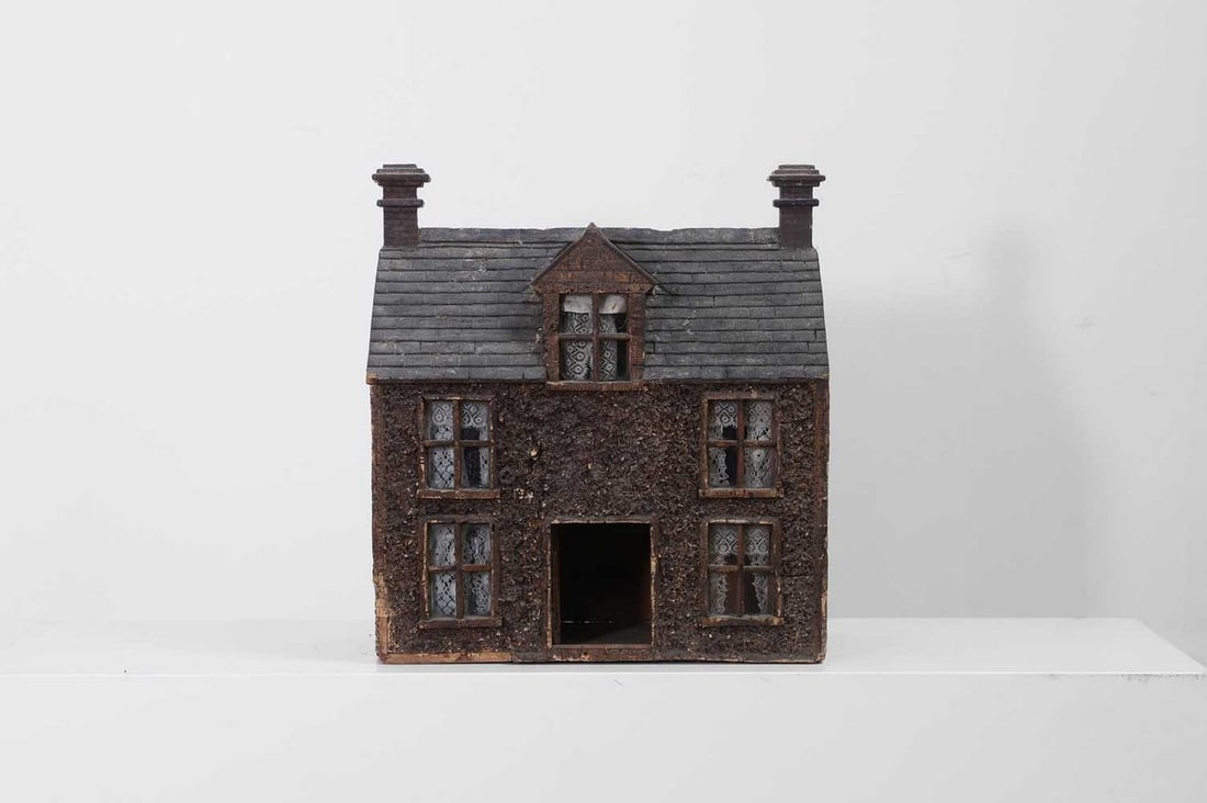 A folk art model of a house, (1 of 5)