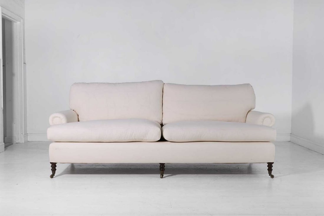 An upholstered three-seater sofa by George Smith, (1 of 4)