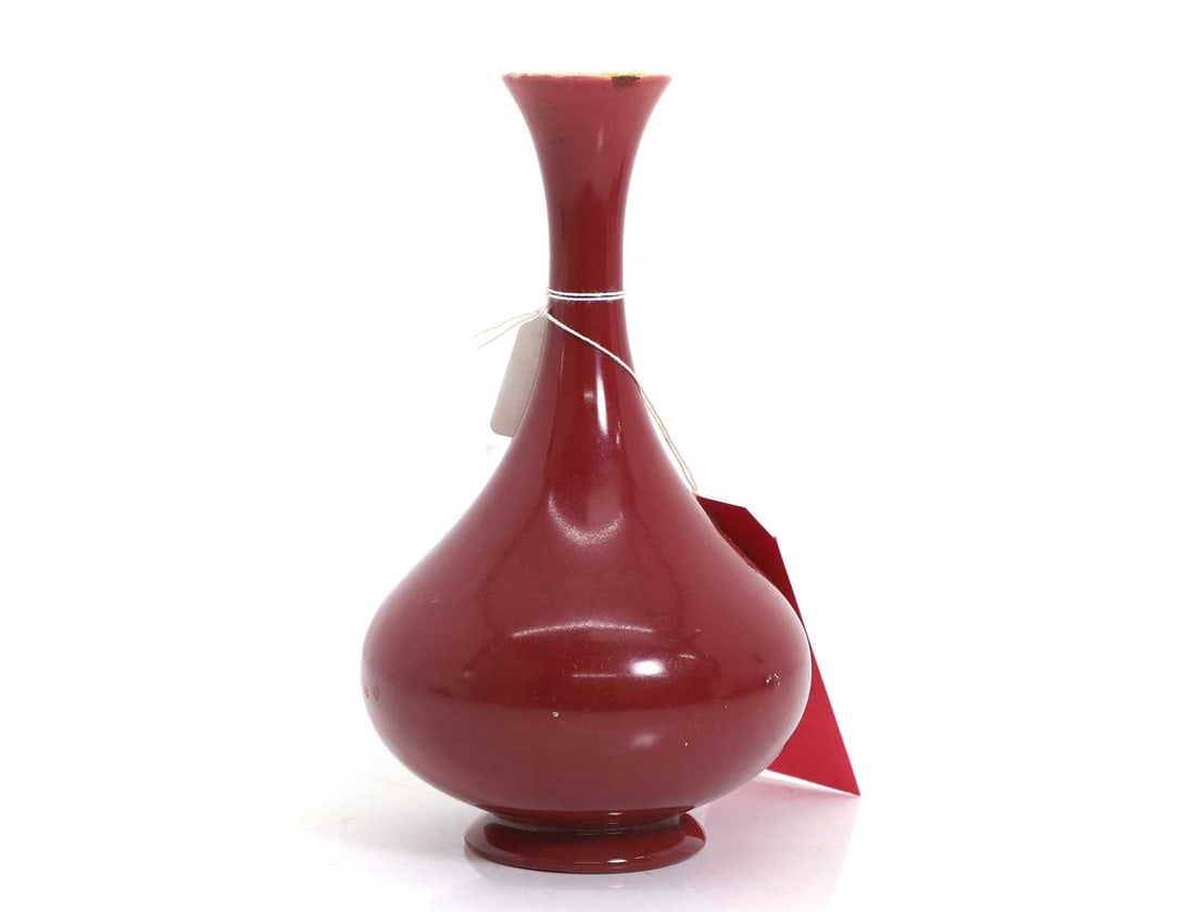 Dr Christopher Dresser (1834-1904) for Linthorpe pottery,: Dr Christopher Dresser (1834-1904) for Linthorpe pottery, a pottery vase, c.1890, of low-shouldered form, in a deep red glaze, impressed 'Linthorpe Ch Dresser 44H',24cm high Condition Report Crazed.