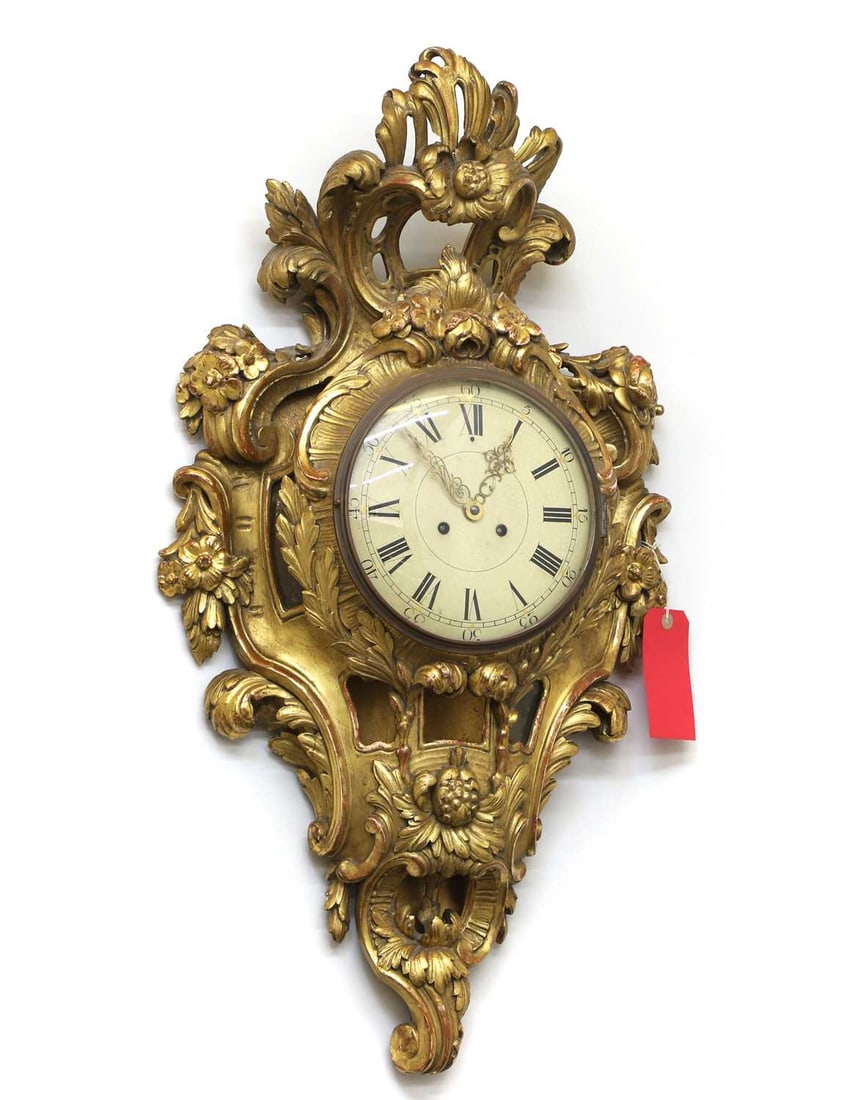 A large Louis XV style giltwood cartel clock, (1 of 20)