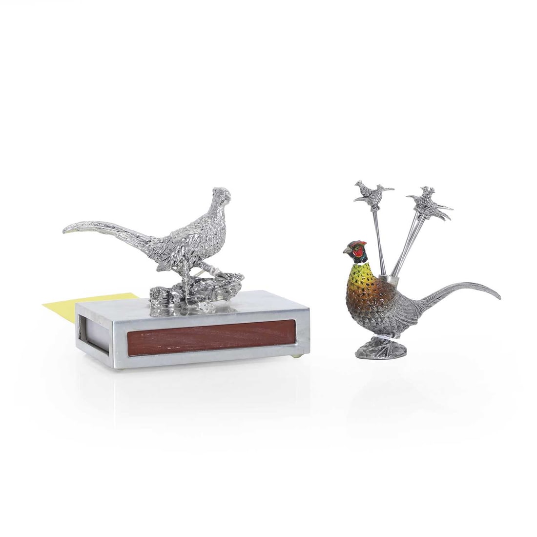 A cast white metal pheasant olive pick and holder Continental, 21st century: A cast white metal pheasant olive pick and holder Continental, 21st century Cold painted decoration with six picks, together with a German matchbox case, surmounted with a pheasant pick holder 10cm