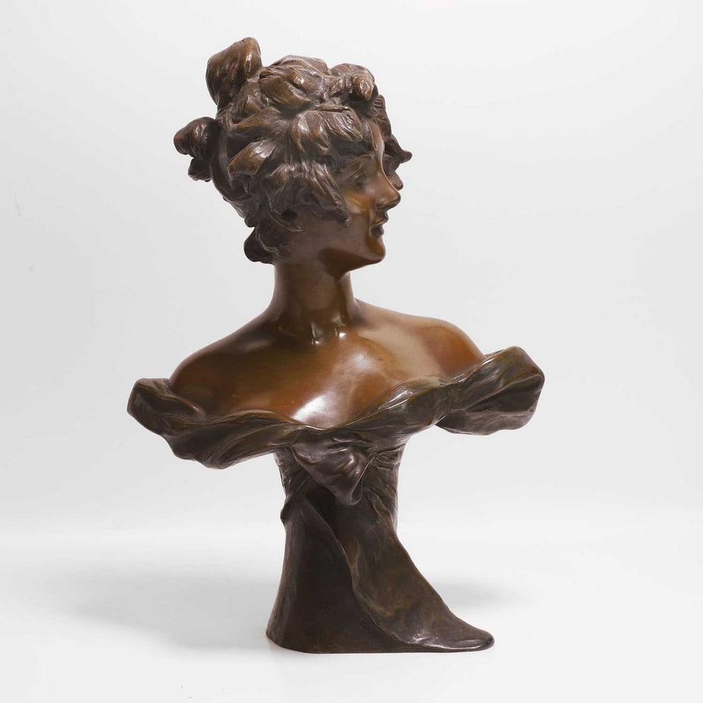 Georges Van der Straeten (Belgian, 1856-1941) An Art Nouveau bust of a young woman (1 of 5)