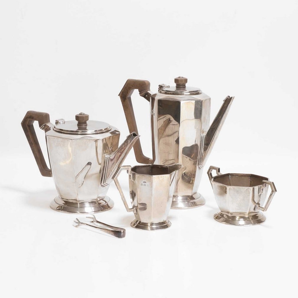Deakin & Francis An Art Deco silver four-piece tea service: Deakin & Francis An Art Deco silver four-piece tea service Birmingham 1933, each piece of octagonal form, comprising a lidded tea pot, lidded coffee pot, twin-handled sugar bowl and a milk jug, with